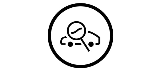 Icon of a car with a magnifying glass.