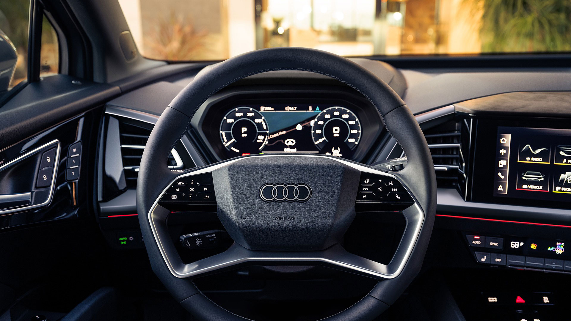 Close-up of the steering wheel of an Audi. 