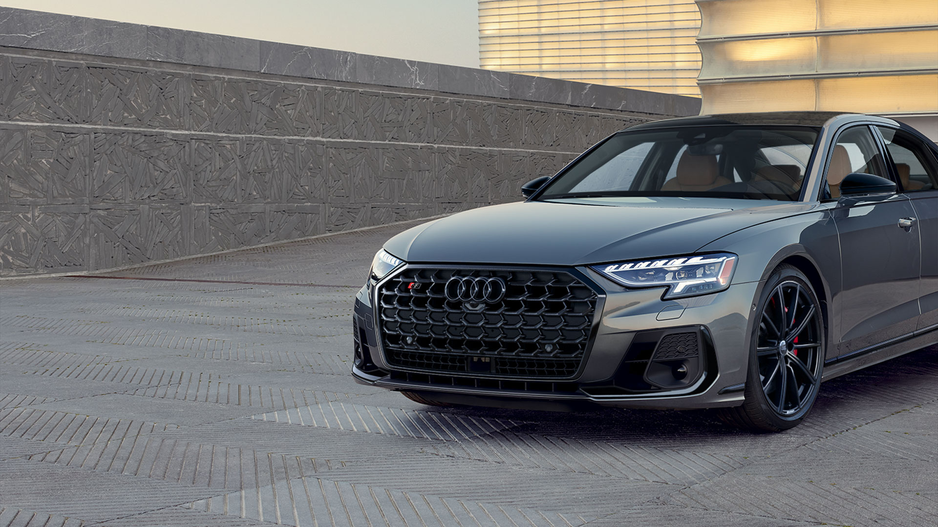 Close-up of the front end of a gray Audi S8.